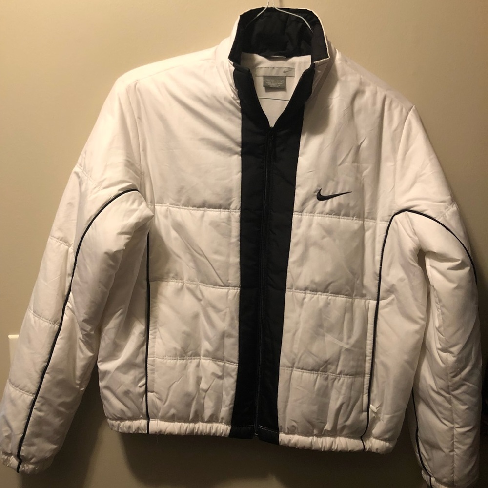 Woman’s medium NIKE white coat